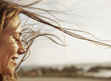 Woman with hair in the wind